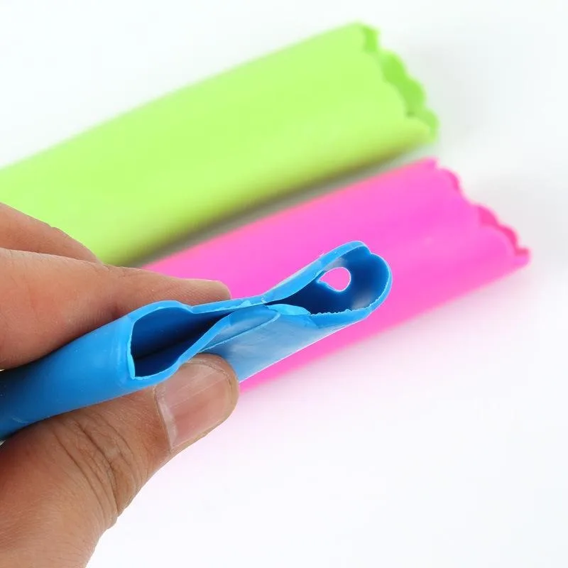 5 PCS Soft Resin Tube Shaped Reusable Magic Handheld Rolling Garlic Peeler Kitchen Tools (Random Color Delivery)
